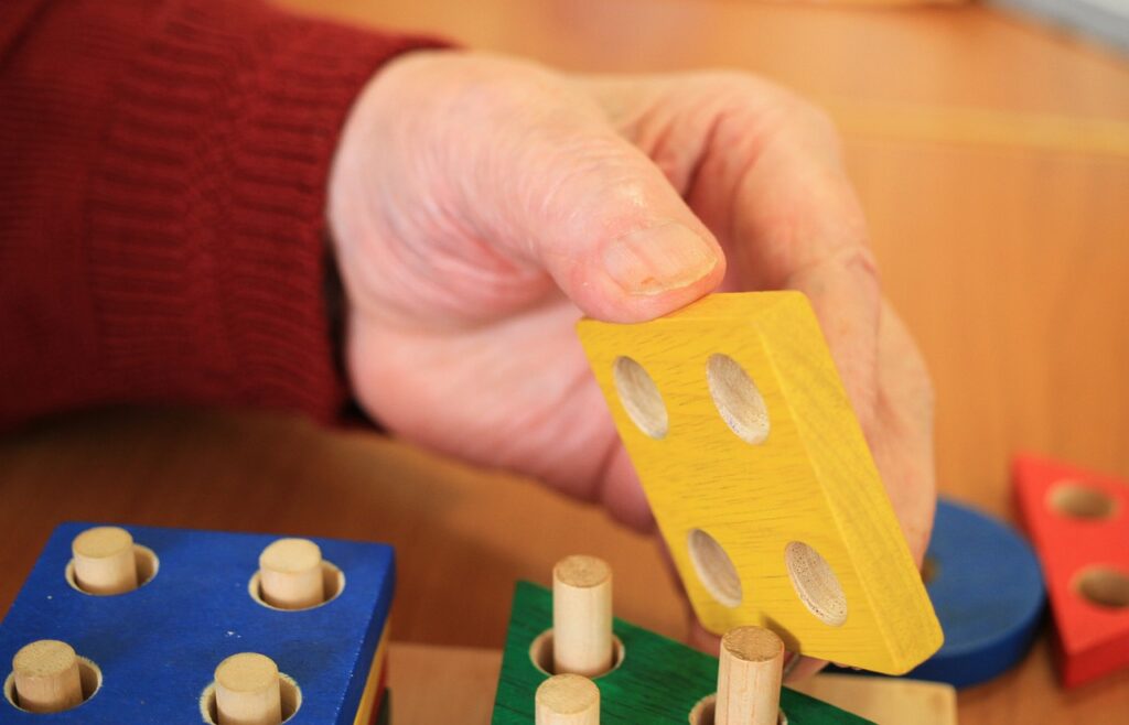 hands, dementia, skills, resources, patience, endurance, concentration, wood blocks, module, receive, support financially, blue, green, yellow, red, building blocks, wooden toys, wood, motor skills, dementia, dementia, dementia, dementia, dementia, motor skills, motor skills